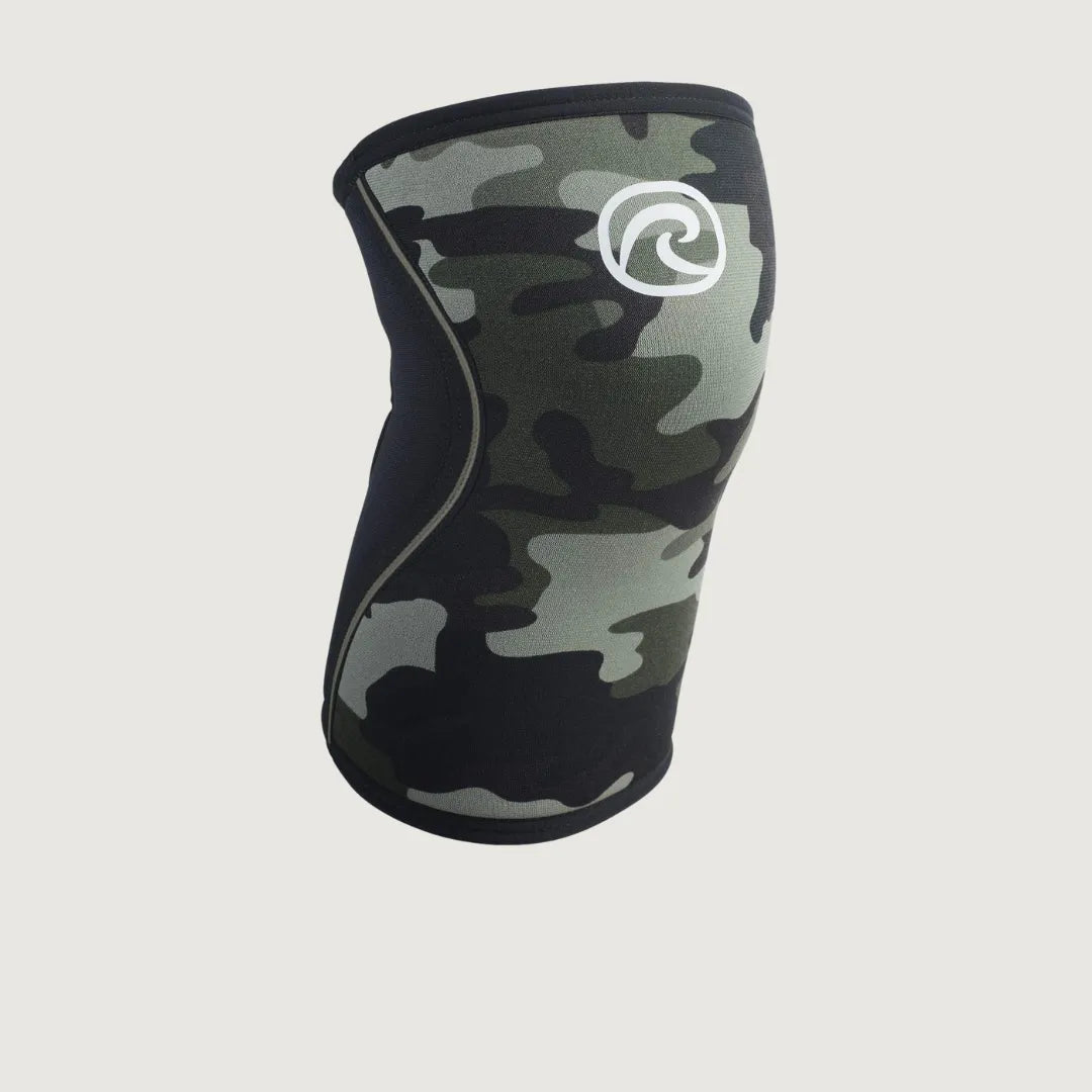 Rehband camo knee sleeve with white logo and black side panel – angled side view