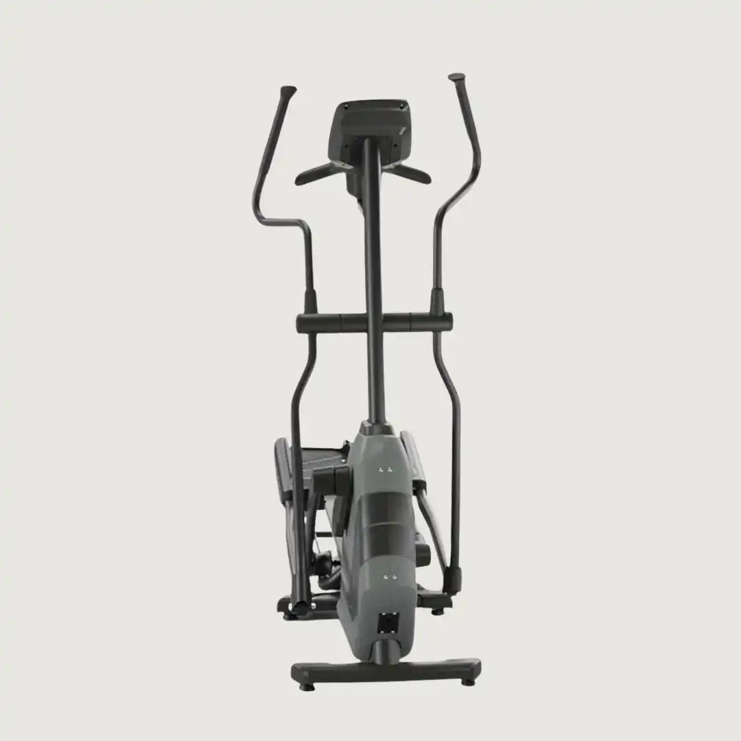 Angled front view of Horizon elliptical with wide foot pedals and handle grips