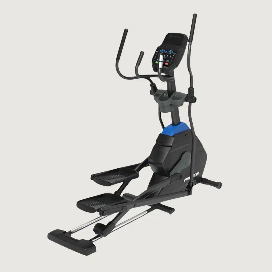 Angled view of Horizon elliptical with blue accents and large foot pedals