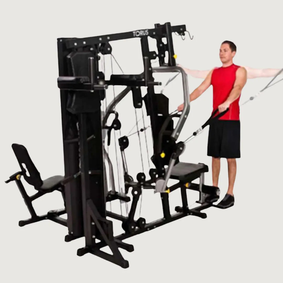 Man doing a chest press workout using the front handles of the multi-gym machine.