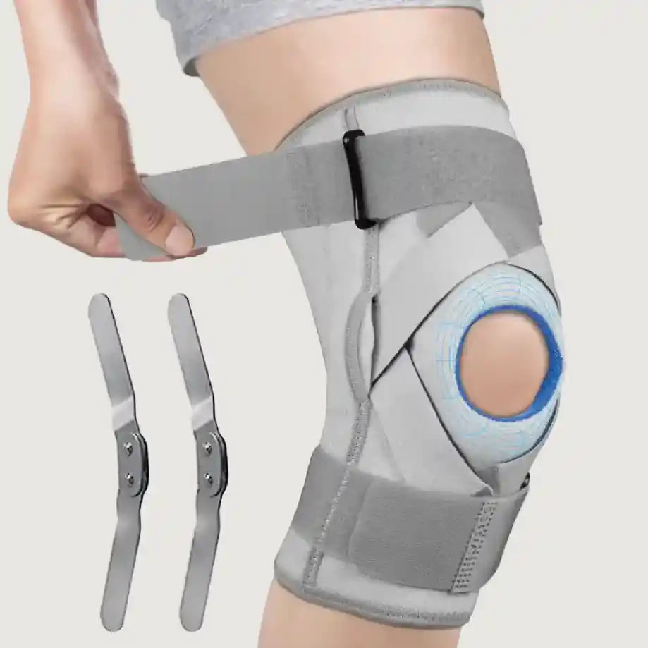 Gray knee brace with a clear plastic cover on a light gray background