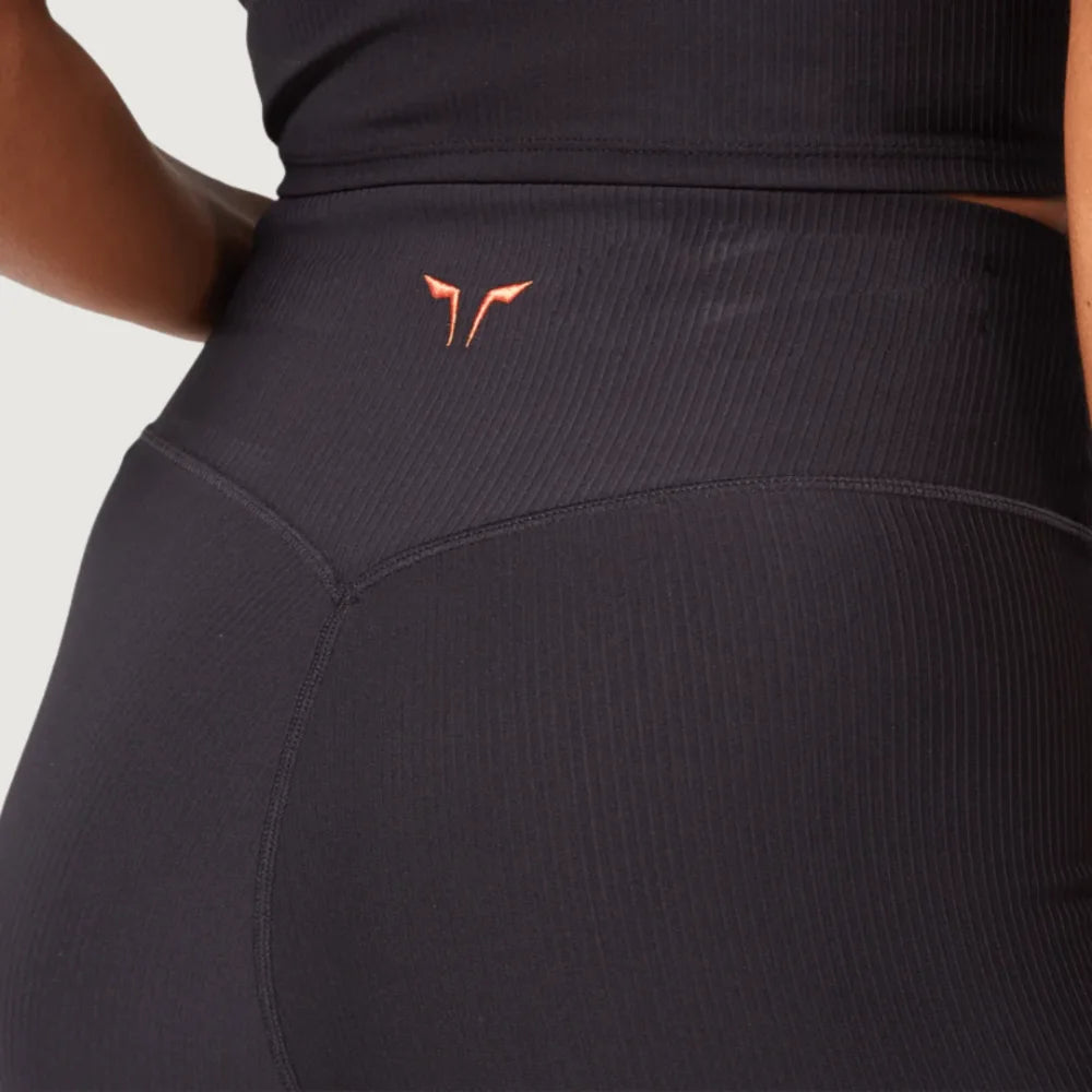 Back view showing curved waistband design