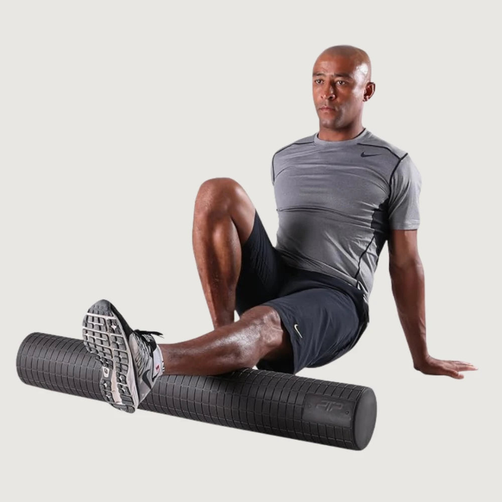 Athlete using roller for back muscle release
