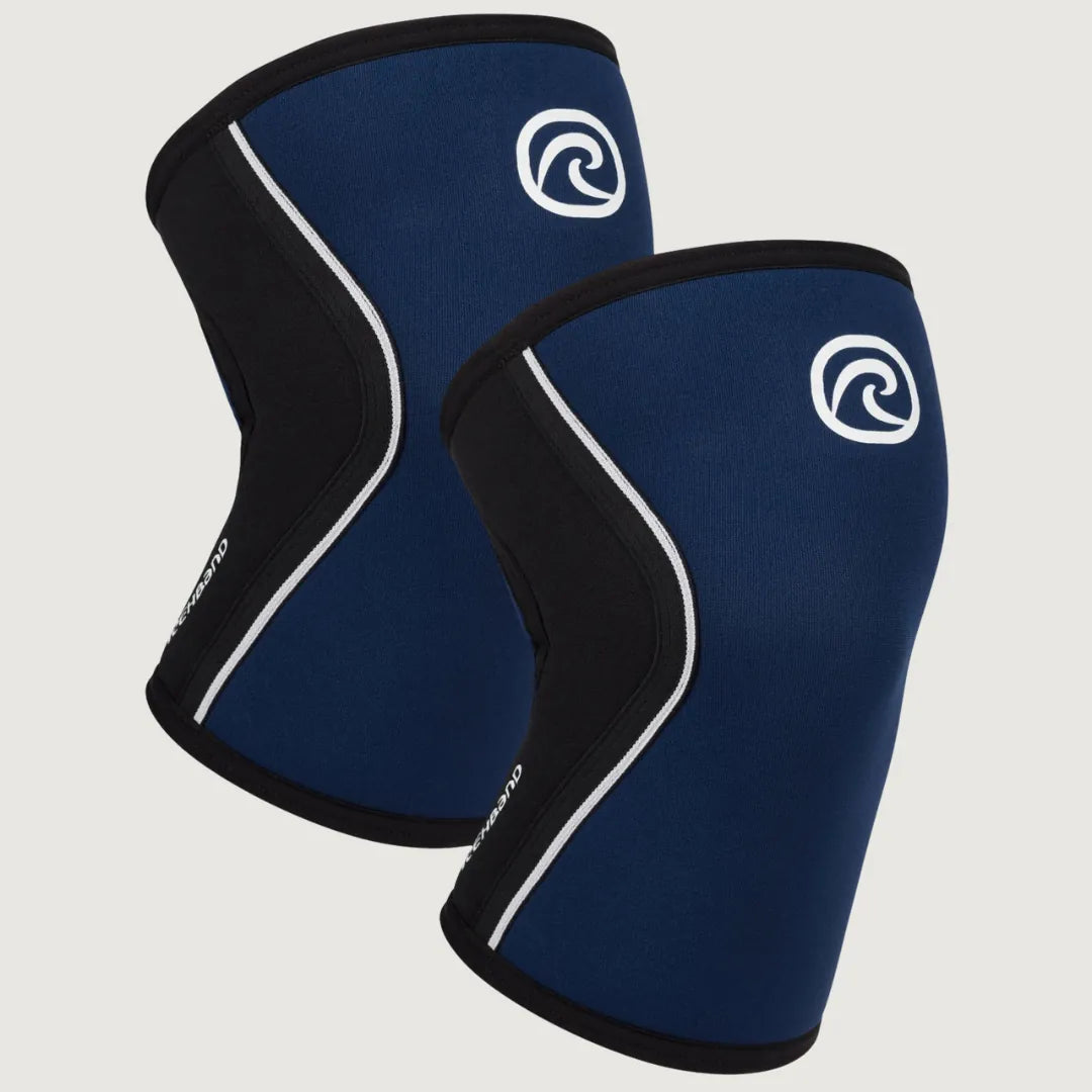 Pair of navy blue and black Rehband RX knee sleeves with white logo and ergonomic seam design