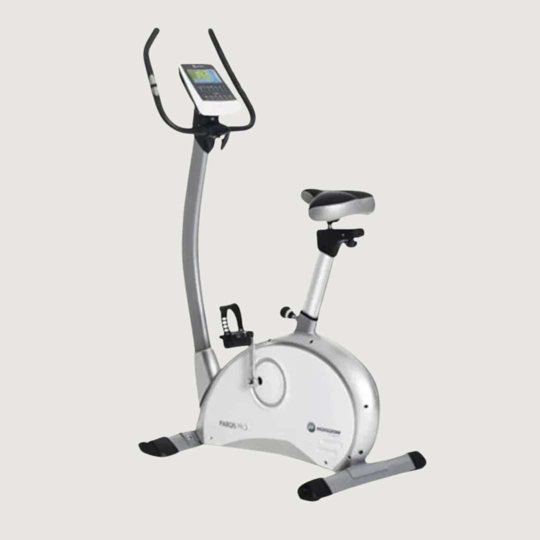 Upright exercise bike with digital display on a light gray background